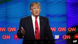 FILE - Republican presidential candidate, businessman Donald Trump, speaks during the Republican presidential debate sponsored by CNN, Salem Media Group and the Washington Times at the University of Miami, March 10, 2016.
