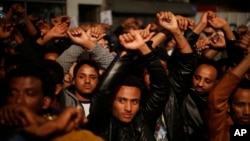 Asylum seekers protest against deportation in Tel Aviv, Israel, Feb. 24, 2018. Israel considers the vast majority of the nearly 40,000 migrants to be job seekers and says it has no legal obligation to keep them. The Africans, nearly all from dictatorial Eritrea and war-torn Sudan, say they fled for their lives and face renewed danger if they return. 