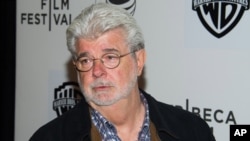 FILE - George Lucas attends the Tribeca Talks: Director Series during the Tribeca Film Festival at the BMCC Tribeca Performing Arts Center on Friday, April 17, 2015, in New York. 