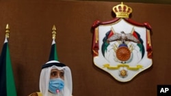 Kuwaiti Foreign Minister Ahmad Nasser al-Sabah speaks during a news conference in Amman, Jordan, Oct. 19, 2020.