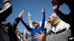 Nationalist supporters of Sgt. Elor Azaria react outside the Israeli military court during his sentencing in Tel Aviv, Israel, Feb. 21, 2017.