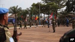 FILE - United Nations peace keeping troops take part in a ceremony in the capital city of Bangui, Central African Republic.