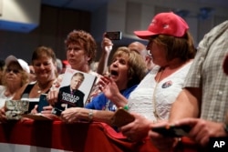 Supporters cheer for Republican presidential candidate Donald Trump during a campaign rally, Aug. 12, 2016, in Altoona, Pa.