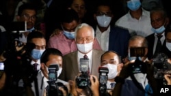 Former Malaysian Prime Minister Najib Razak leaves the courthouse in Kuala Lumpur, Malaysia, July 28, 2020.