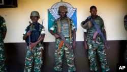 FILE - African peacekeeping mission troops known as MISCA, listen to U.S Ambassador to the U.N Samantha Power in Bangui, Central African Republic, April 9, 2014. 