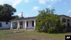 FILE - This house used to belong to U.S. citizen Daniel Smith in the Isle of Pines, Cuba. Photo taken March 2015. The property was confiscated by the new Cuban government after the revolution.