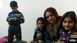 Ali's mother, Iman, and her four children were imprisoned as human shields by IS militants as Iraqi forces attacked, recapturing their area early this year in Mosul, Iraq, on Jan. 27, 2017. (H.Murdock/VOA)