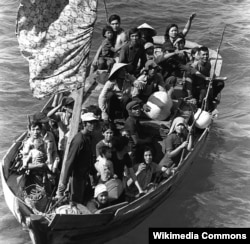 Vietnamese boat people rescued northeast of Cam Ranh Bay, Vietnam, after spending eight days at sea. 15 May 1984. (US Navy)
