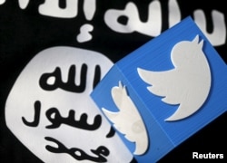 A 3-D printed logo of Twitter and an Islamic State flag are seen in this picture illustration taken Feb. 18, 2016.