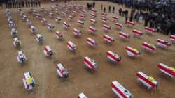 مەڕاسیمی بەخاکسپاردنی پاشماوەکانی 104 ئێزیدی کە شەش ساڵ پێشتر بە دەستی داعش کوژرابوون. گوندی کۆچۆ 6 ی مانگی دووی 2021