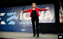 Democratic presidential candidate Elizabeth Warren speaks during the Iowa Democratic Party's Hall of Fame Celebration, June 9, 2019, in Cedar Rapids, Iowa.