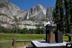 President Barack Obama speaks by the Sentinel Bridge, in front of the Yosemite Falls, the highest waterfall in Yosemite National Park, Calif., June 18, 2016.