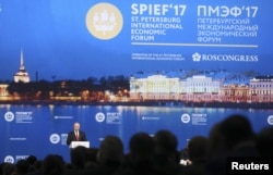 Russian President Vladimir Putin delivers a speech during a session of the St. Petersburg International Economic Forum (SPIEF), June 2, 2017.