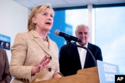 Democratic presidential candidate Hillary Clinton speaks to medical professionals after taking a tour of Borinquen Health Care Center, in Miami, Florida, Aug. 9, 2016, to see how they are combatting Zika.
