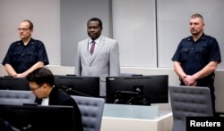 FILE - Central African Republic's soccer executive and alleged militia leader, Patrice-Edouard Ngaissona, appears before the International Criminal Court in The Hague, Netherlands, Jan. 25, 2019.