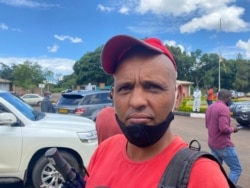 Unemployed 42-year-old Quinton Hassen, shown here in Harare, Zimbabwe, Feb. 18, 2021, says he can’t wait to be vaccinated against COVID-19. He has to wait as the country imports vaccines. (Columbus Mavhunga/VOA)