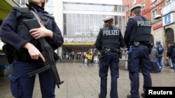German police secure the main train station in Munich, Germany, January 1, 2016.