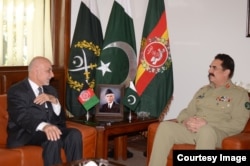 Afghan President Ashraf Ghani, left, meets with Pakistani General Raheel Sharif at army headquarters in Rawalpindi, Pakistan, Nov. 14, 2014. (Photo courtesy of Pakistani army)
