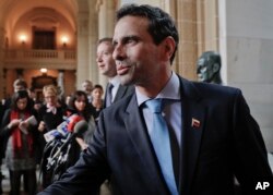 Venezuelan opposition leader Henrique Capriles arrives to speak to members of the media following his meeting with Organization of America States (OAS) Secretary General Luis Almagro, at the OAS building in Washington, March 31, 2017.