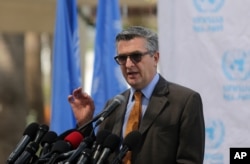 FILE - Filippo Grandi.