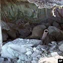 An image taken from an Inter Services Public Relations video shows a destroyed Pakistani army post after a NATO attack in the Pakistan-Afghanistan border area, November 30, 2011