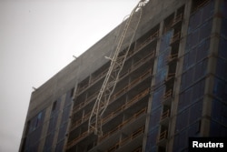 A collapsed construction crane is seen in downtown Miami as Hurricane Irma swept through south Florida, Sept. 10, 2017.
