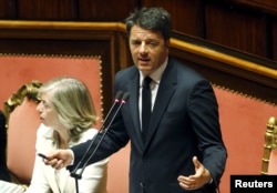 Prime Minister Matteo Renzi, addressing Italian lawmakers in Rome, says the European Union must take a collective stand against migrant trafficking, April 22, 2015.