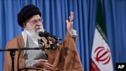 FILE - Ayatollah Ali Khamenei speaks at a meeting with a group of Revolutionary Guards and their families, in Tehran, Iran, April 9, 2019.