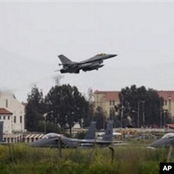A Danish F-16 aircraft takes off from the NATO airbase in Sigonella, on the southern Italian Sicily island, March 20, 2011
