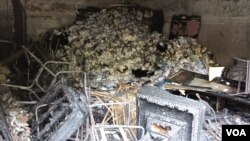 The fire at Shafiq headquarters in Cairo was confined to a garage out back. (Elizabeth Arrott/VOA)