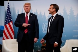 President Donald Trump meets with French President Emmanuel Macron during the G-7 summit, June 8, 2018, in Charlevoix, Canada.