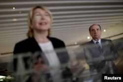 Brazil's Foreign Minister Aloysio Nunes Ferreira listens to Venezuela's former chief prosecutor Luisa Ortega Diaz during a news conference, in Brasilia, Brazil, Aug. 23, 2017.