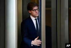 Alex van der Zwaan leaves Federal District Court in Washington, Feb. 20, 2018. Van der Zwaan, pleaded guilty to a single charge of making false statements.
