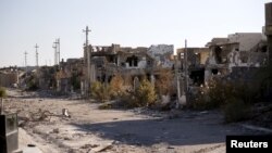 FILE - Destroyed buildings are seen in the city of Ramadi, January 16, 2016. Baghdad and Washington have touted Ramadi as the first major success for Iraq's U.S.-backed army since it collapsed in the face of Islamic State's lightning advance across the country's