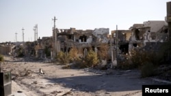 Destroyed buildings are seen in the city of Ramadi, Jan. 16, 2016.