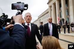Defense Secretary James Mattis answers a question from members of the Polish media, before a arrival ceremony for Poland's Minister of Defense Mariusz Blaszczak, April 27, 2018, at the Pentagon.