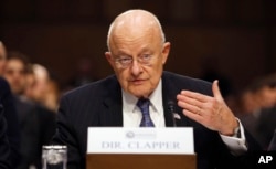 FILE - Director of National Intelligence James Clapper testifies on Capitol Hill in Washington, Feb. 9, 2016.
