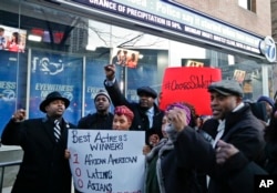 Protestors gather outside of the offices of WABC-TV to rally for more diversity in the film industry, Feb. 28, 2016, in New York.