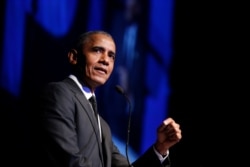 FILE - In this Dec. 12, 2018, photo, former President Barack Obama accepts the Robert F. Kennedy Human Rights Ripple of Hope Award at a ceremony in New York.