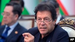 FILE - Pakistan's Prime Minister Imran Khan speaks at a summit in Bishkek, Kyrgyzstan, June 14, 2019. 