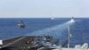 US Aircraft Carrier Strike Group Sails Through Strait of Hormuz
