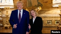 U.S. President-elect Donald Trump meets with Italian Prime Minister Giorgia Meloni at Mar-a-Lago in Palm Beach, Florida, Jan. 4, 2025. (Italian Government/Handout via Reuters) 