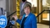 FILE - Randi Weingarten, president of the American Federation of Teachers, talks during a news conference in front of the Richard R. Green High School of Teaching, Sept. 8, 2020, in New York. 
