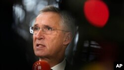NATO Secretary General Jens Stoltenberg speaks with the media in Brussels on Nov. 14, 2023. Stoltenberg will visit Kosovo and Serbia next week.