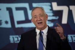 FILE - Blue and White party leader Benny Gantz addresses reporters in Tel Aviv, Israel, Nov. 20, 2019.