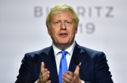 Britain's Prime Minister Boris Johnson speaks during a news conference at the end of the G7 summit in Biarritz, France, Aug. 26, 2019.