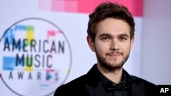 FILE - Zedd arrives at the American Music Awards at the Microsoft Theater.