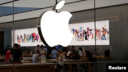People visit an Apple store in Istanbul, Turkey, Aug. 15, 2018. 