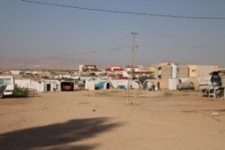 Most of the Yazidi population of Iraq — hundreds of thousands — are displaced, living in formal camps or in towns clustered with tents and makeshift encampments, pictured on Sept. 28, 2019 in Khanke, Kurdistan Region, Iraq. (Heather Murdock/VOA)