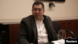 Indonesian businessman Hary Tanoesoedibjo speaks to a reporter at the Trump International Hotel & Tower in Manhattan, New York,, Jan. 18, 2017.